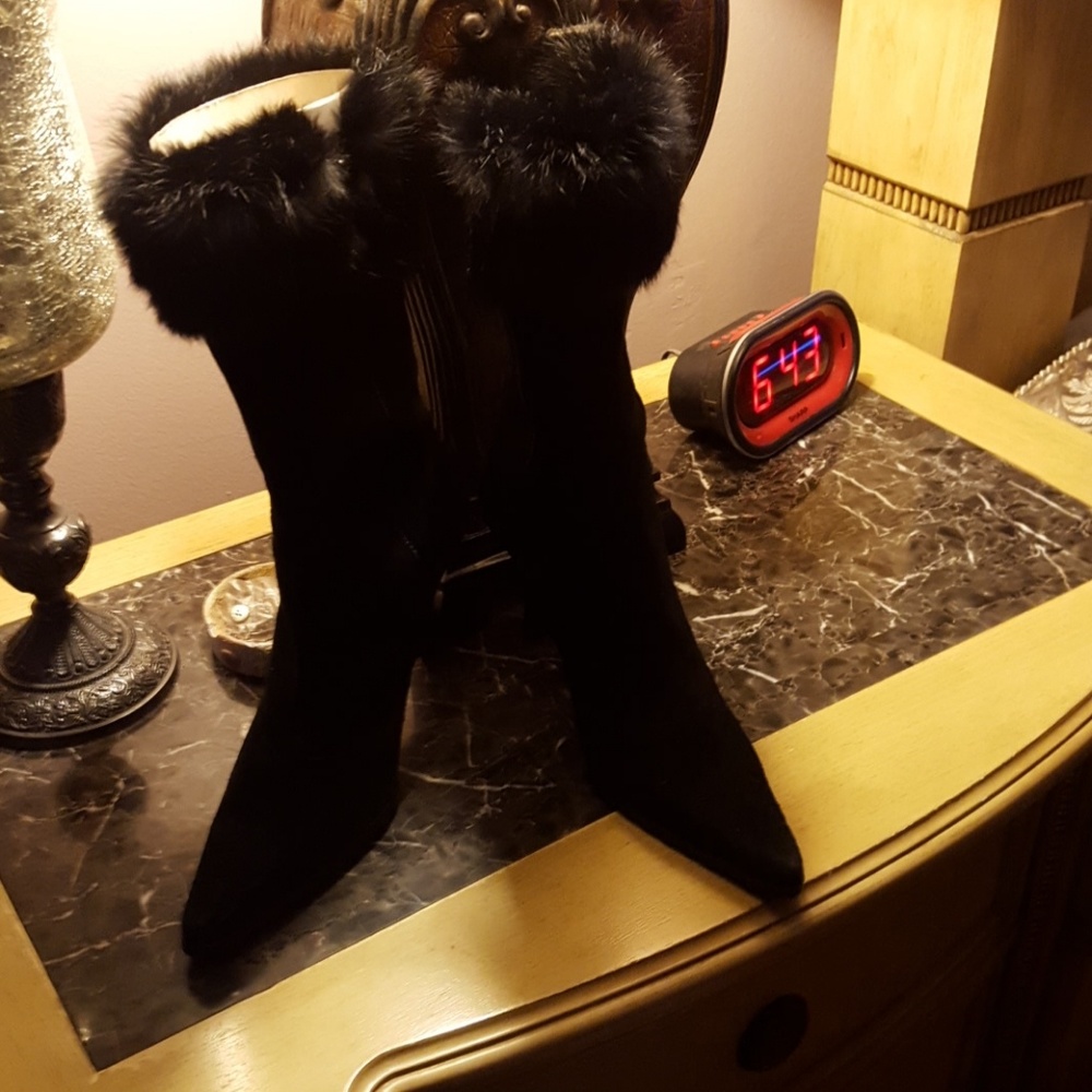 Black suede boots with rabbit fur cuff.